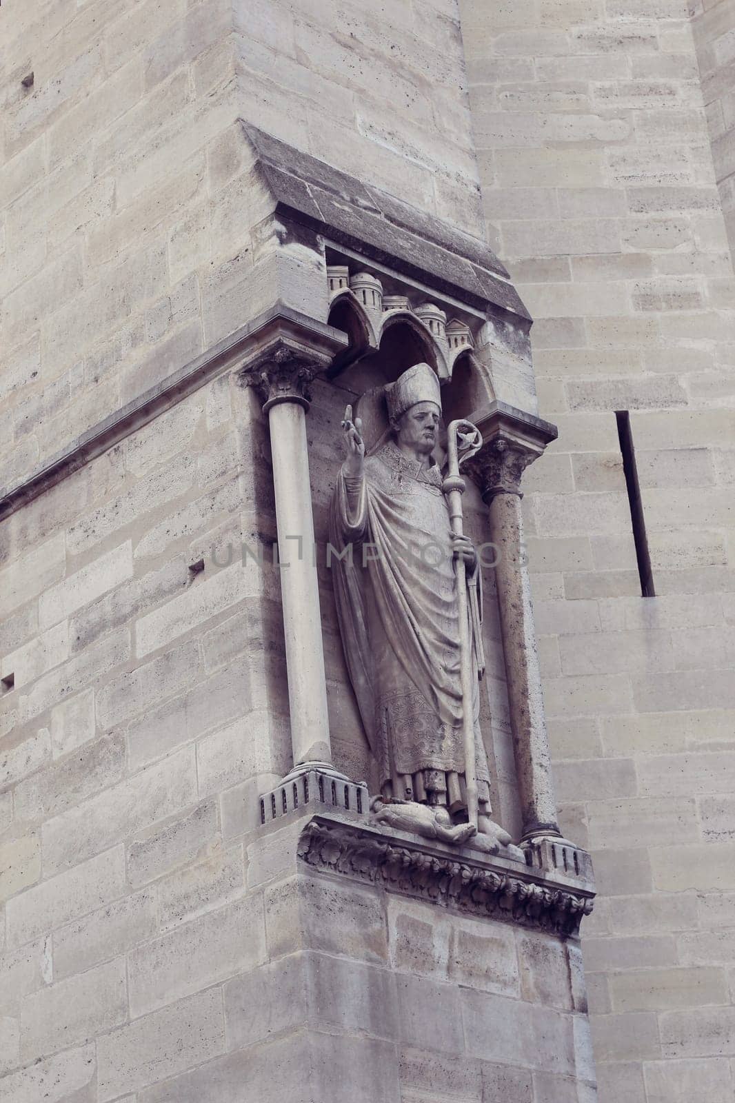 Architectural details of Cathedral Notre Dame de Paris. Cathedral Notre Dame de Paris - most famous Gothic, Roman Catholic cathedral on the eastern half of the Cite Island. France, Europe.