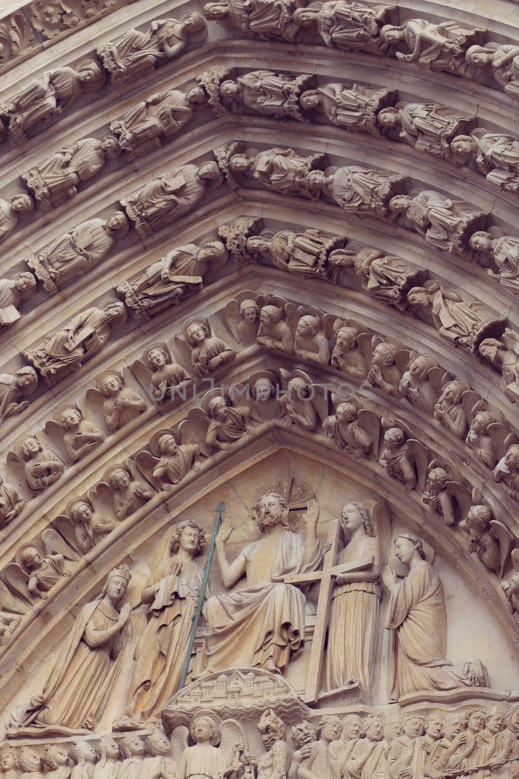 Architectural details of Cathedral Notre Dame de Paris. Cathedral Notre Dame de Paris - most famous Gothic, Roman Catholic cathedral on the eastern half of the Cite Island. France, Europe.