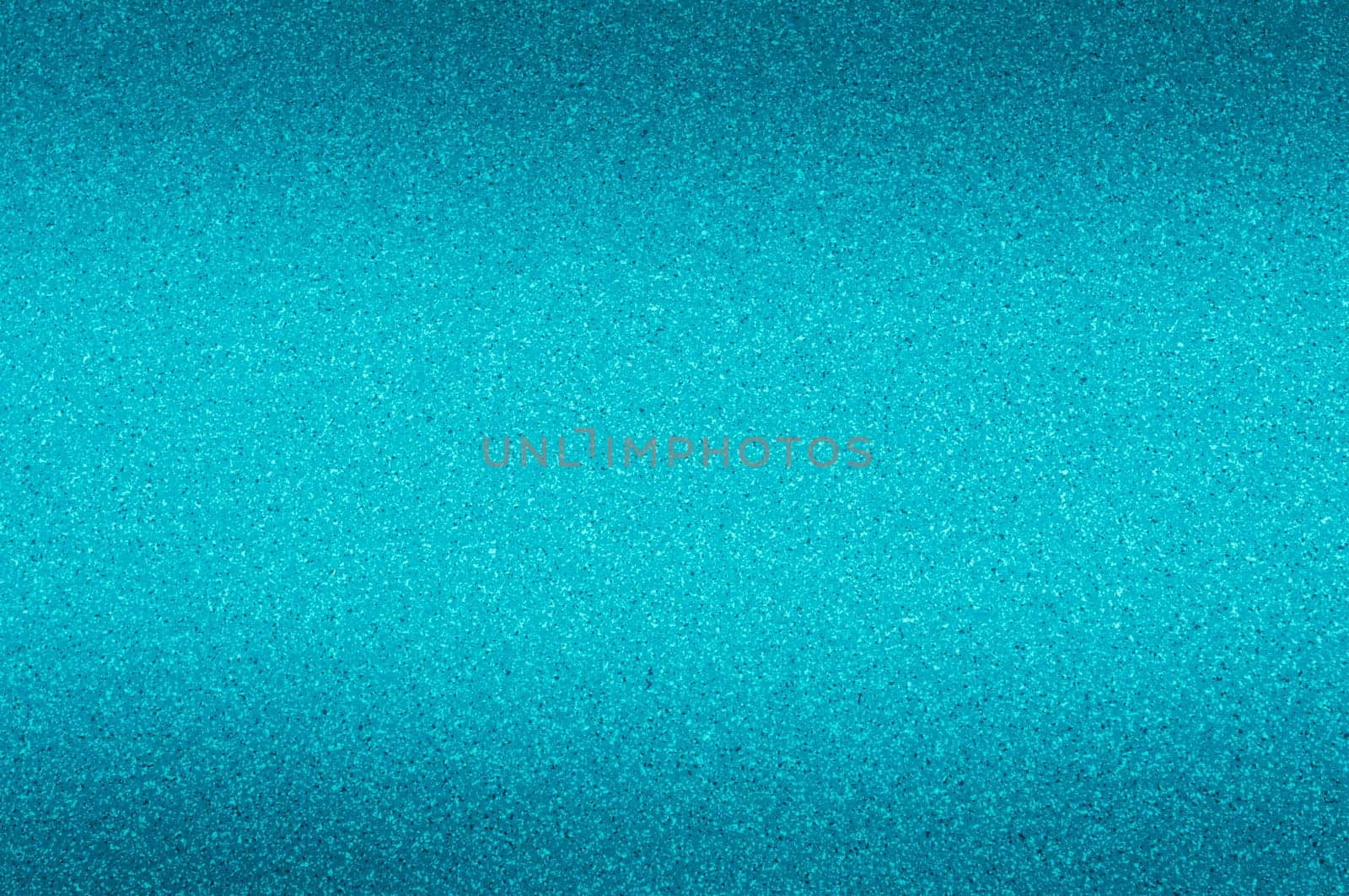 Granite background of blue with small dots.