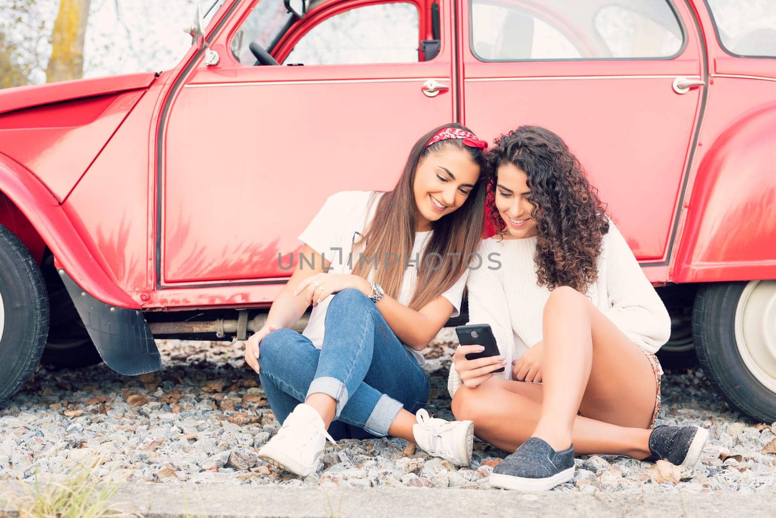Two friends going on a roadtrip through countryside