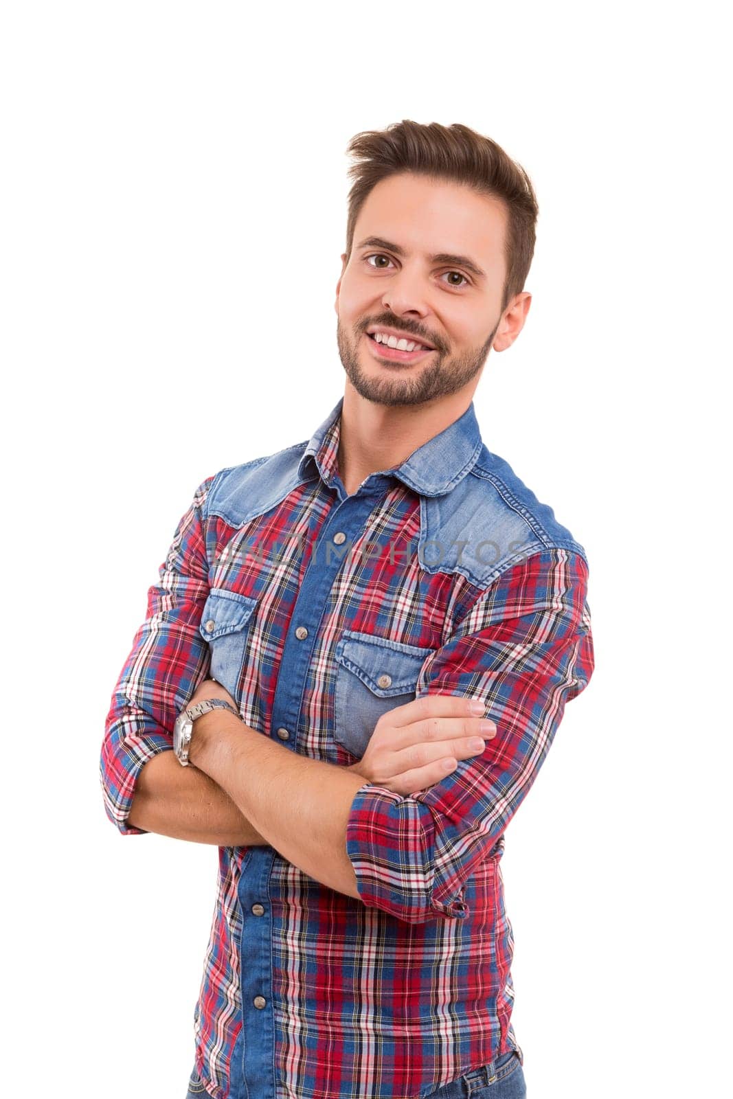 Studio picture of a young and handsome man posing isolated