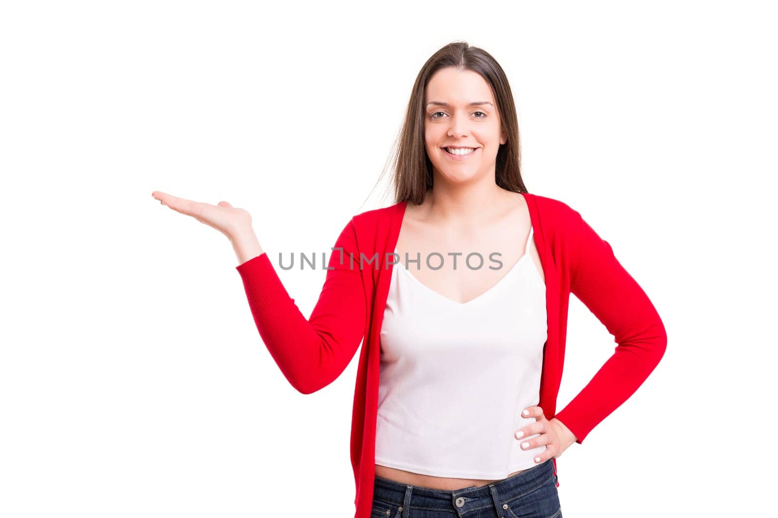 Young beautiful woman presenting your product, isolated over white background