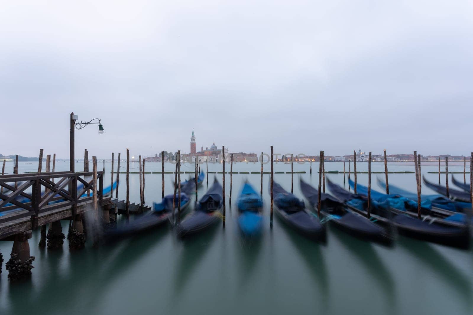 Sunrise in San Marco square, Venice, Italy. Venice Grand Canal. Architecture and landmarks of Venice. Venice postcard with Venice gondolas