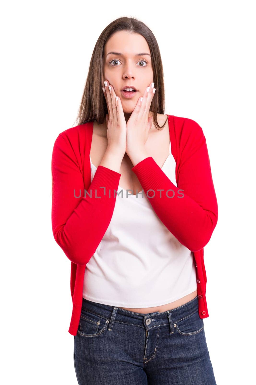 Surprised young woman isolated over white background