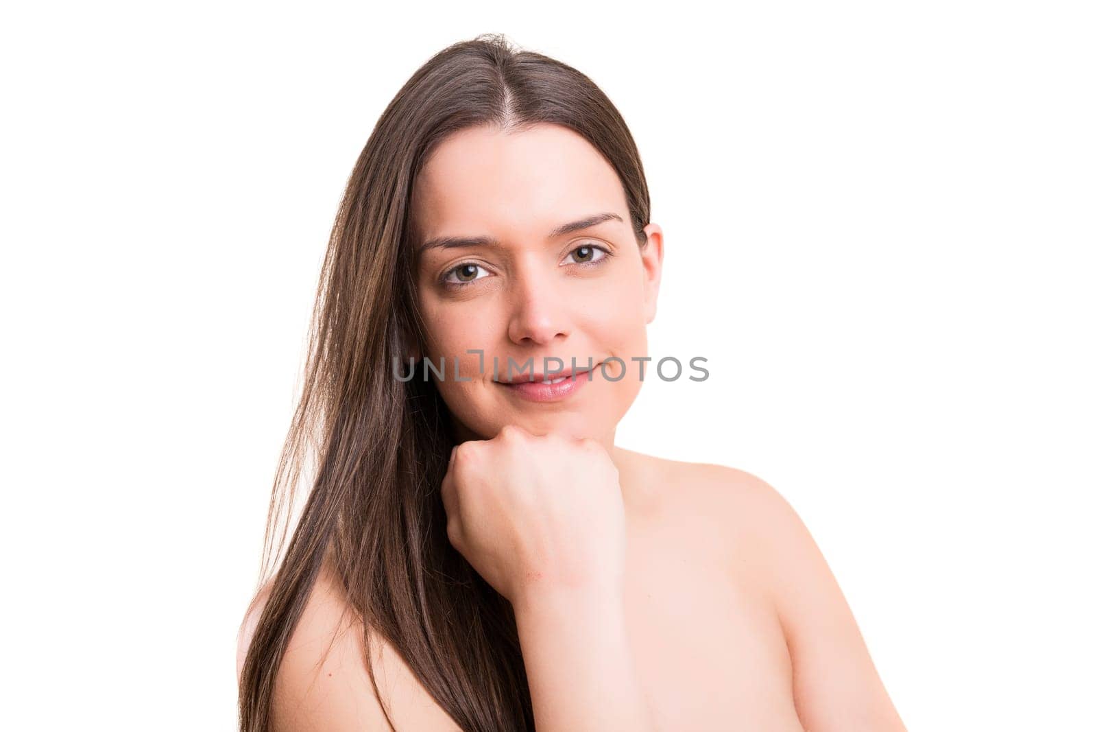 Beautiful woman with perfect skin posing over white