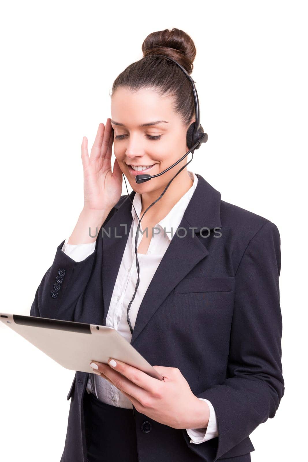 A friendly telephone operator smiling isolated over a white background
