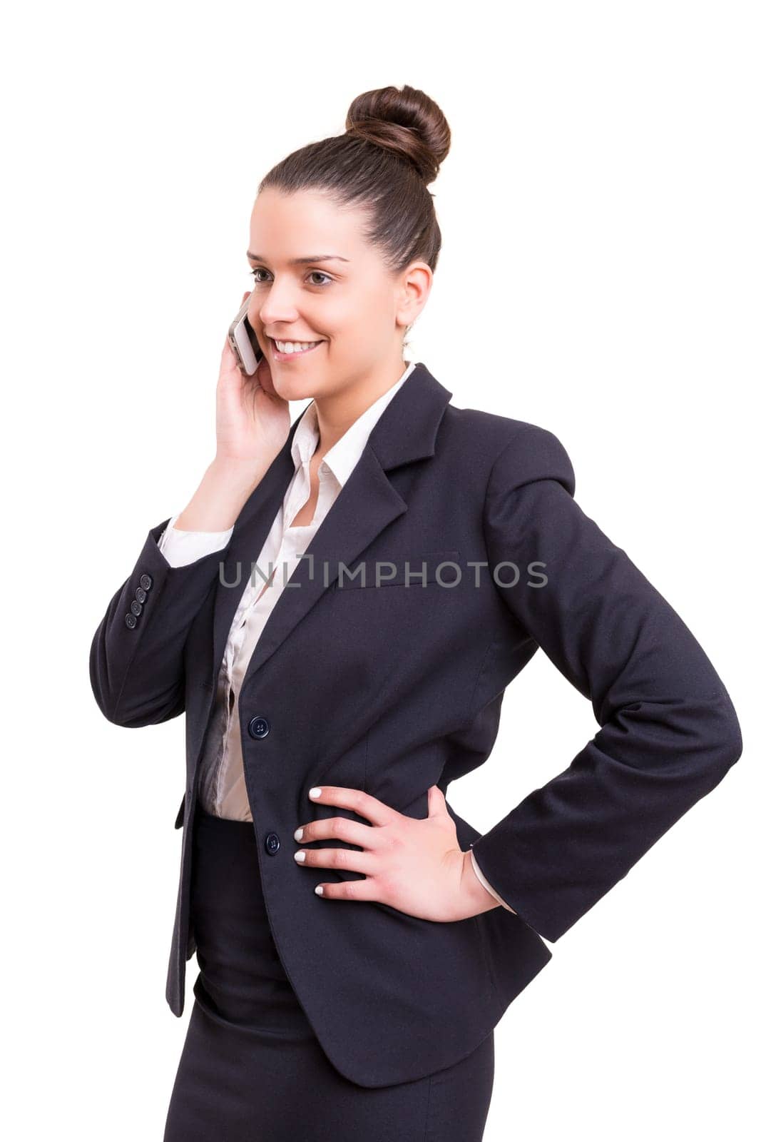 Successful business woman at the phone, isolated over white
