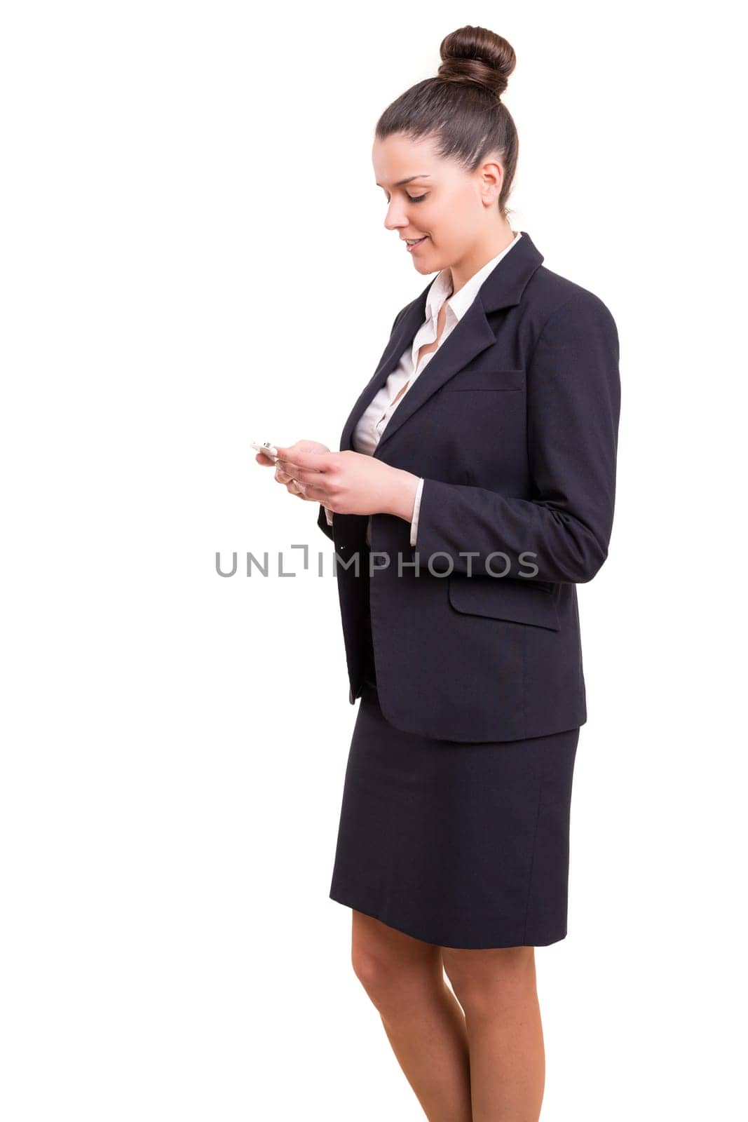 Successful business woman at the phone, isolated over white