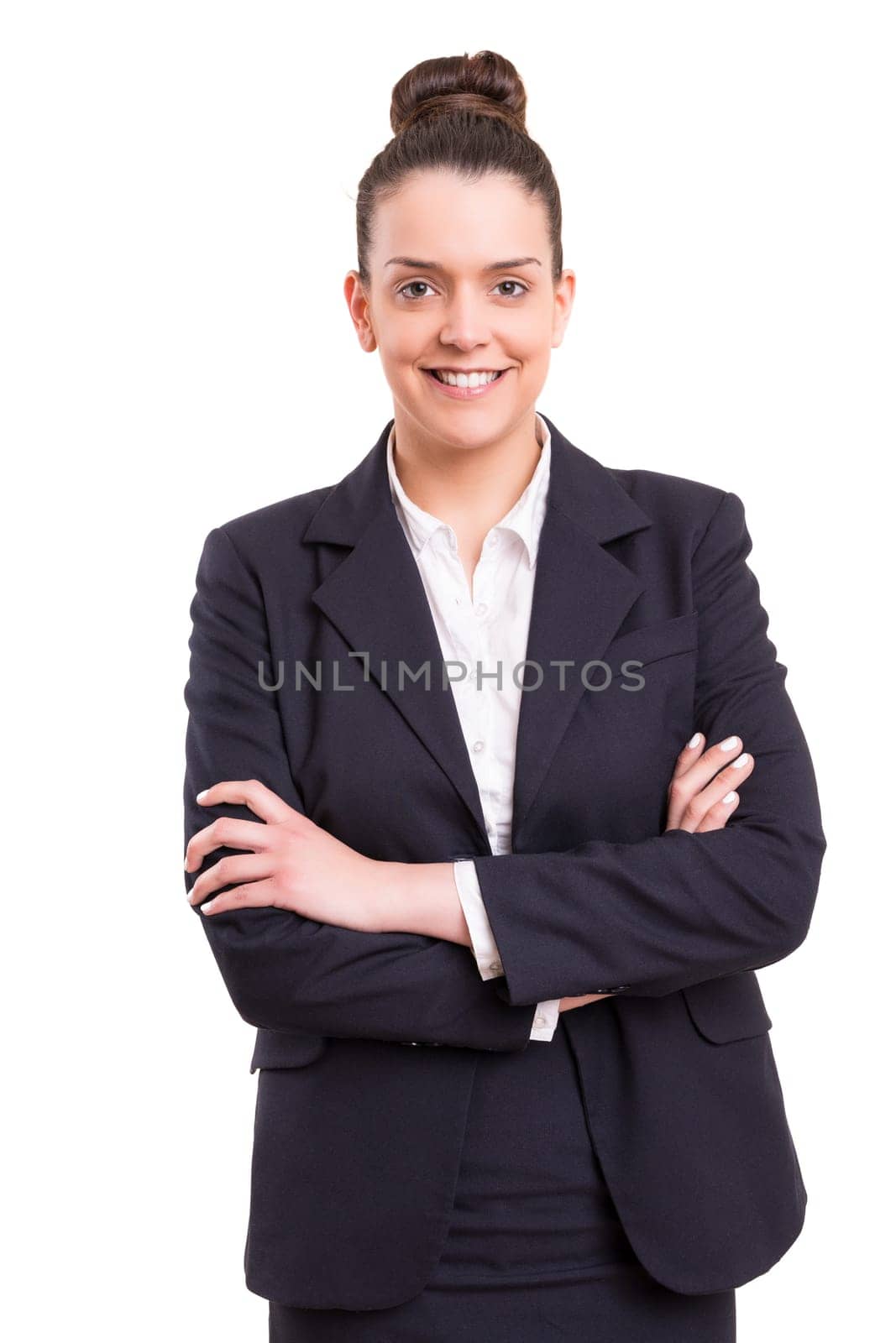 A beautiful business woman posing isolated over white