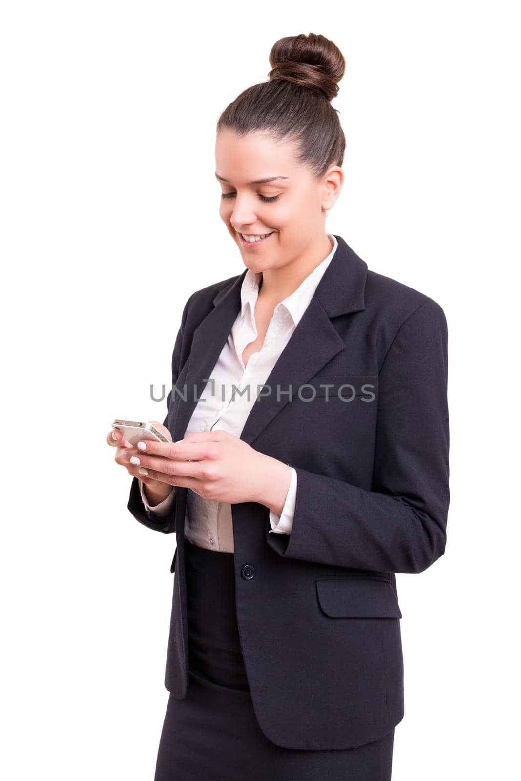 Successful business woman at the phone, isolated over white