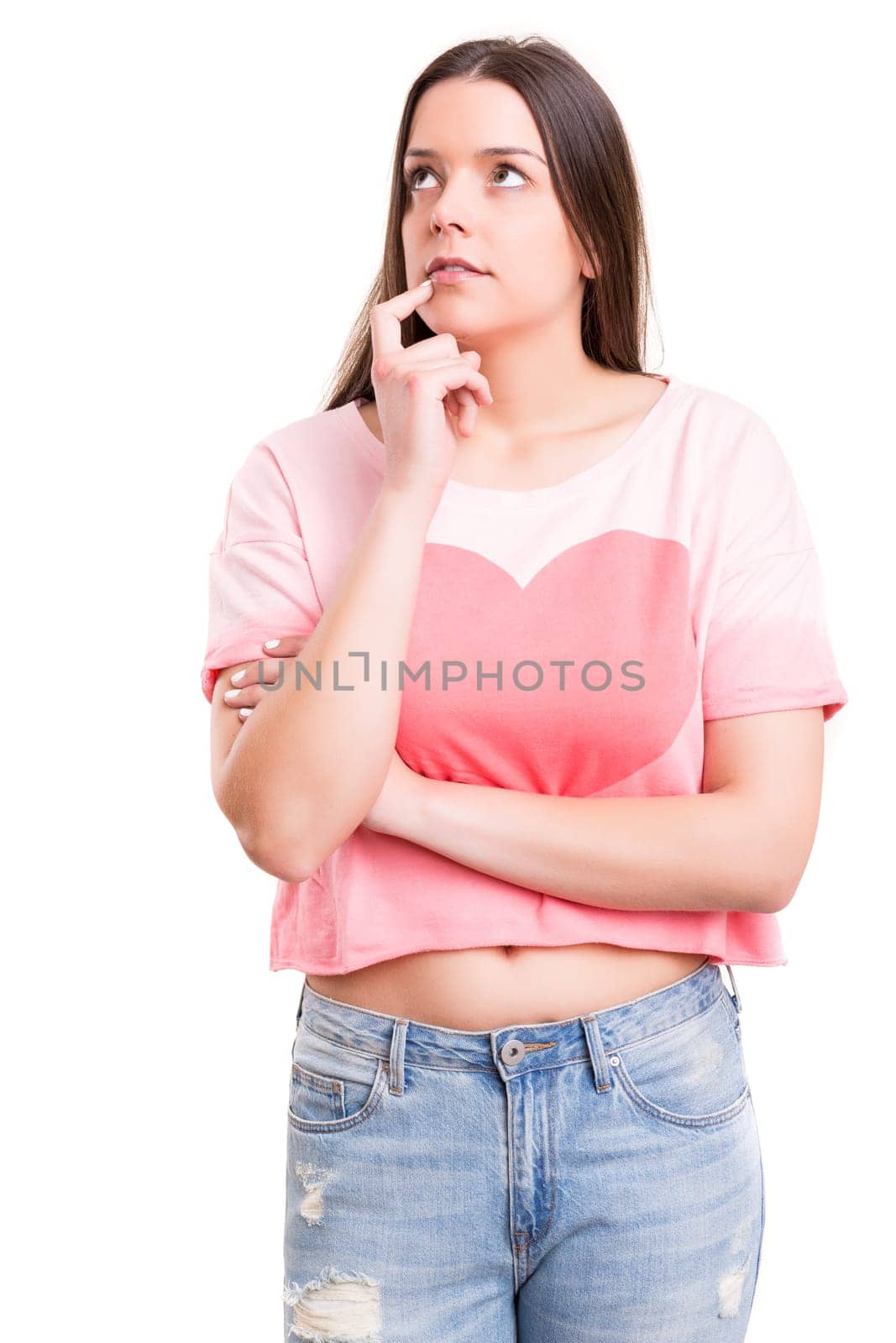 Studio shot: Young woman having a great idea