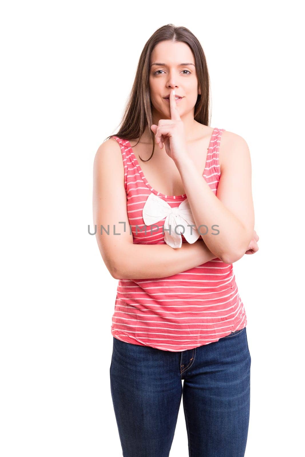 Beautiful young woman asking for silence isolated