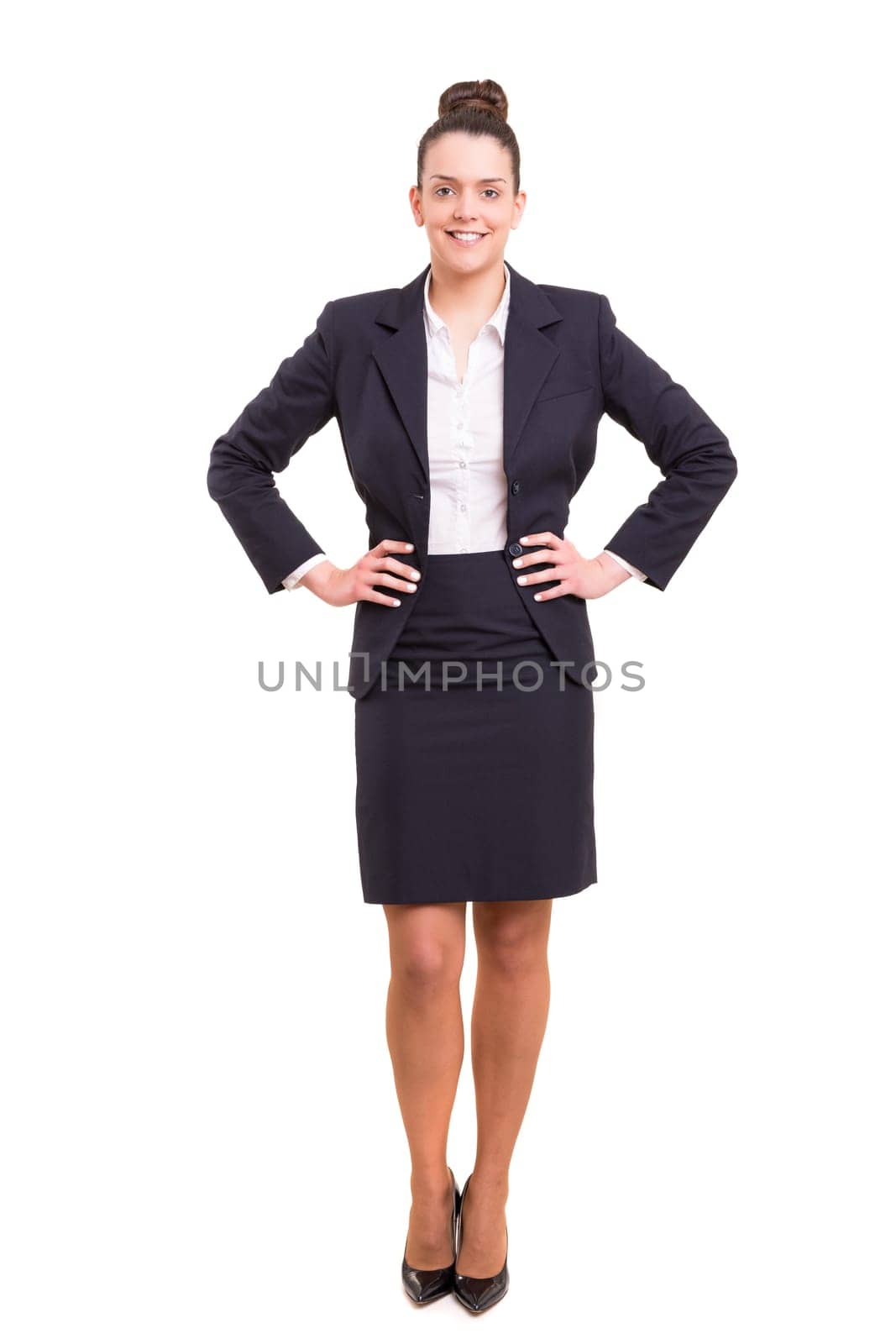 Beautiful young business woman posing isolated