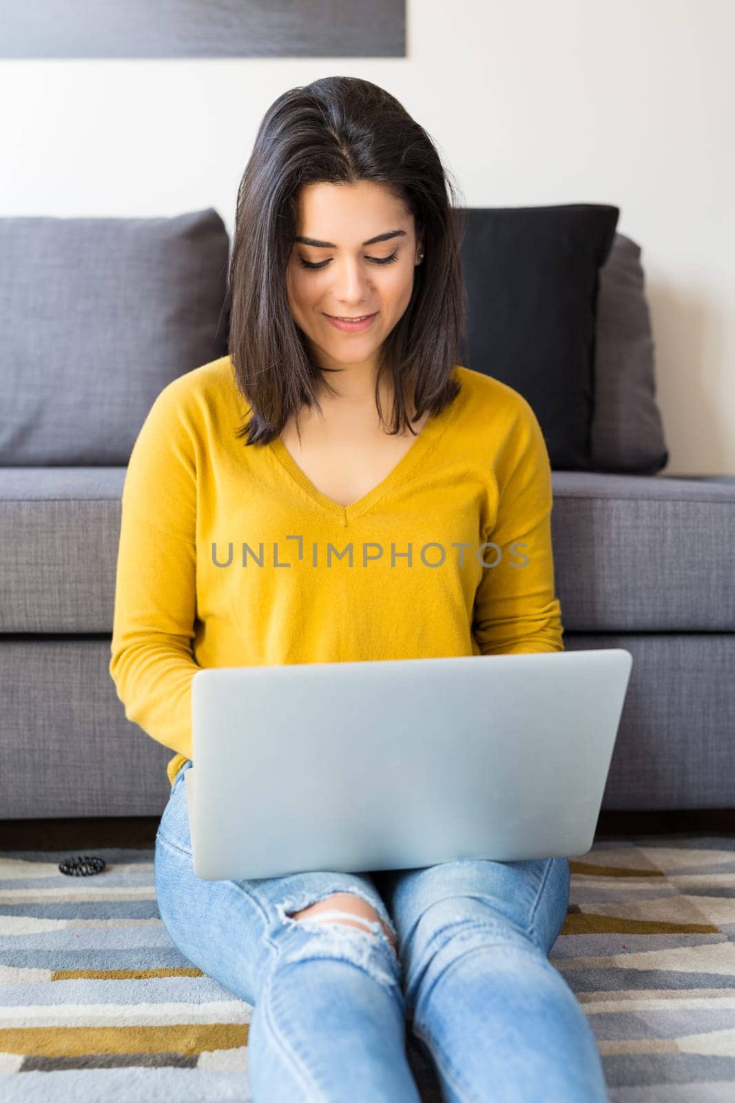 Beautiful woman relaxing with a computer