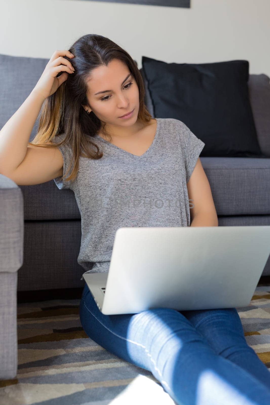 Beautiful woman relaxing with a computer