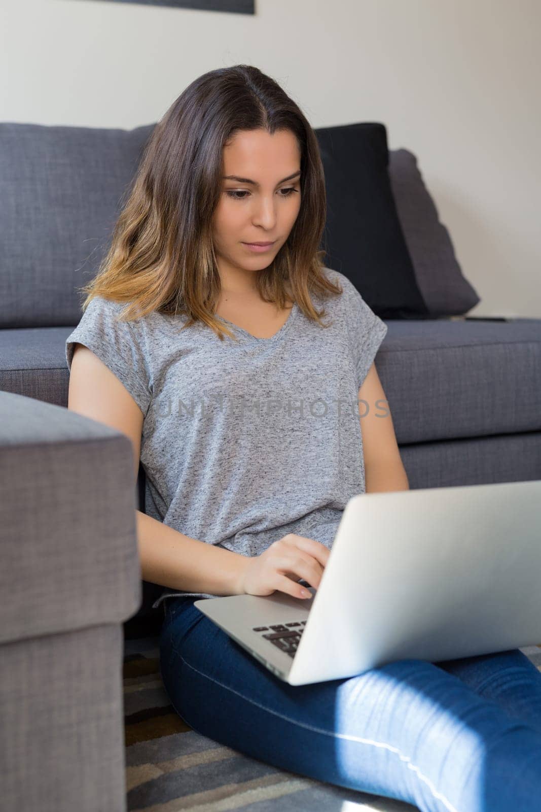 Beautiful woman relaxing with a computer