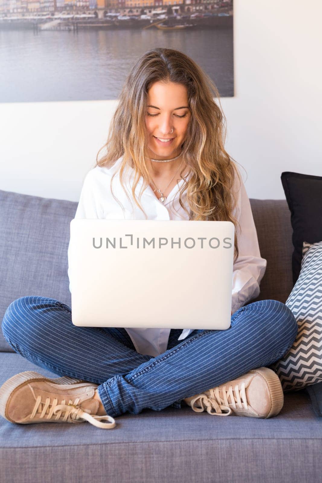 Beautiful woman relaxing with a computer