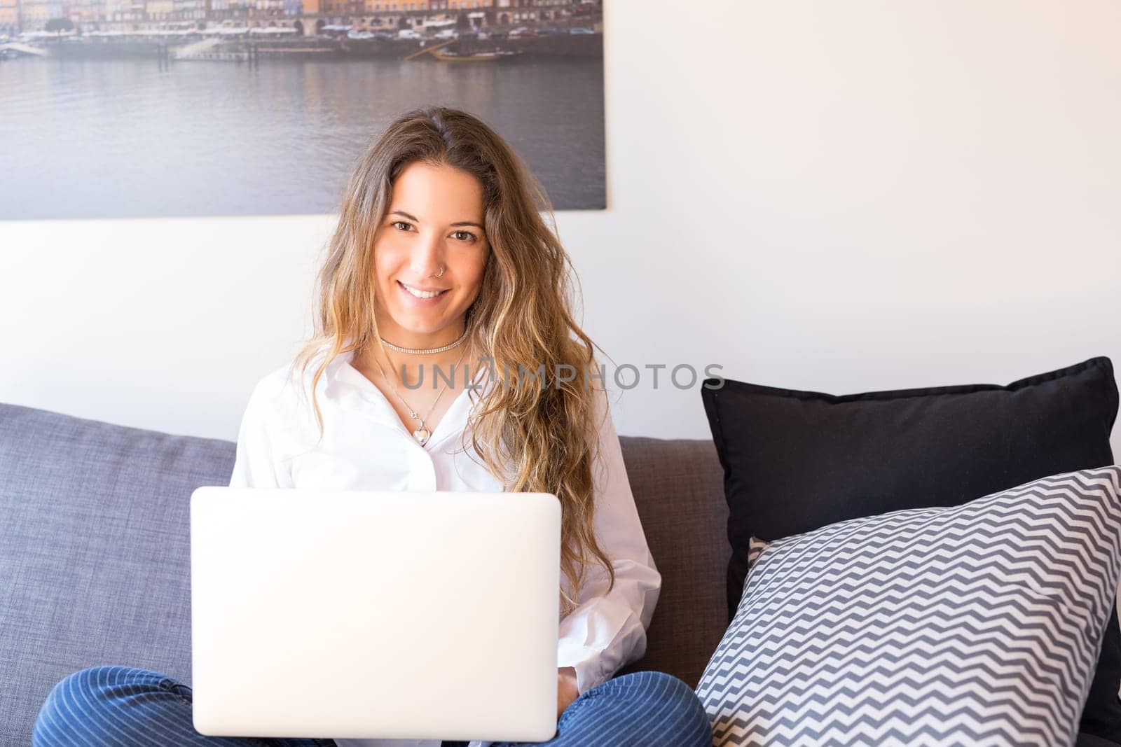 Beautiful woman relaxing with a computer