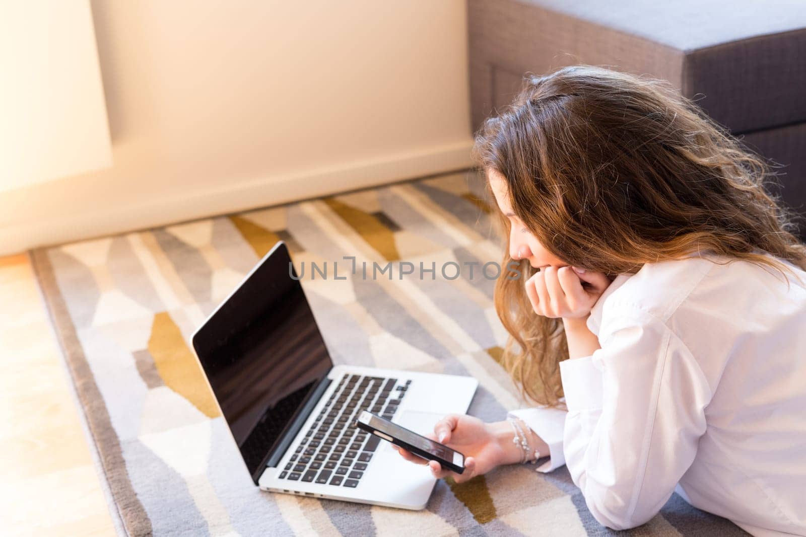 Beautiful woman relaxing with a computer