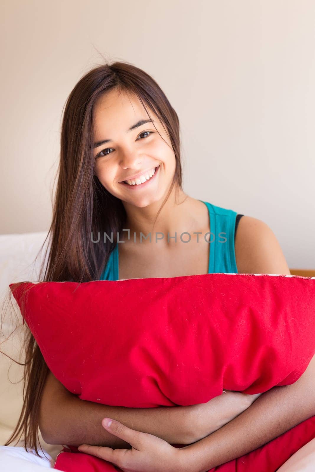 Happy young woman relaxing in the morning