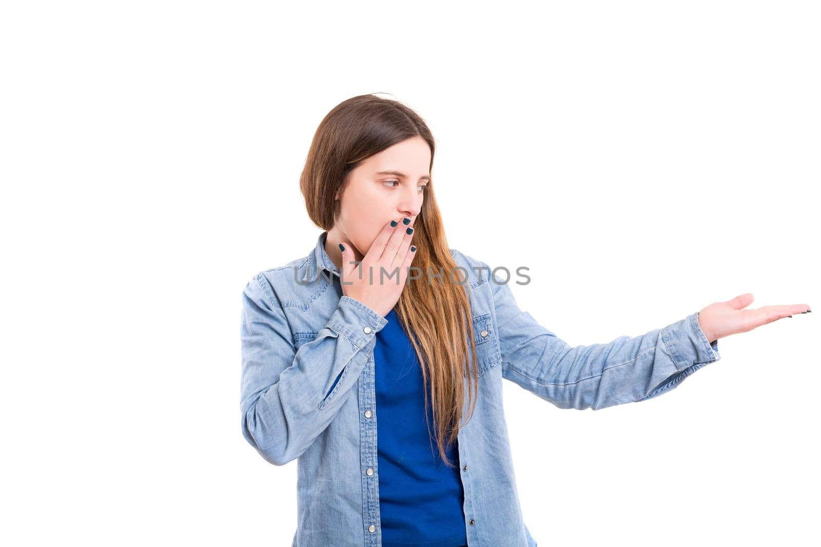 Young beautiful woman presenting your product, isolated over white background