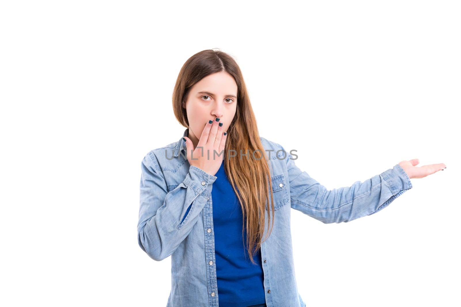Young beautiful woman presenting your product, isolated over white background