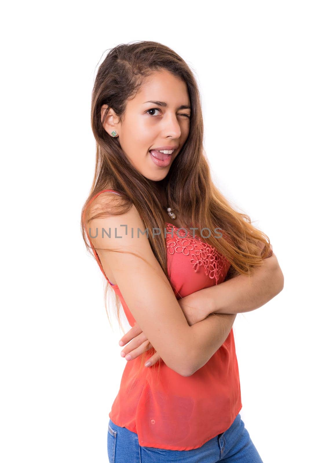Pretty happy woman winking - isolated over white background