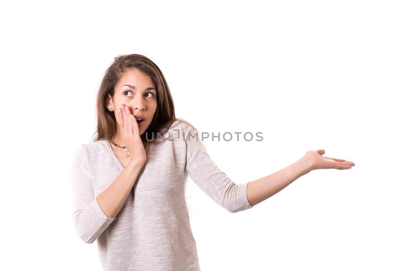 Young beautiful woman presenting your product, isolated over white background
