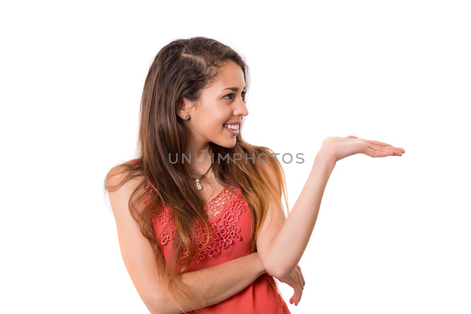 Young beautiful woman presenting your product, isolated over white background