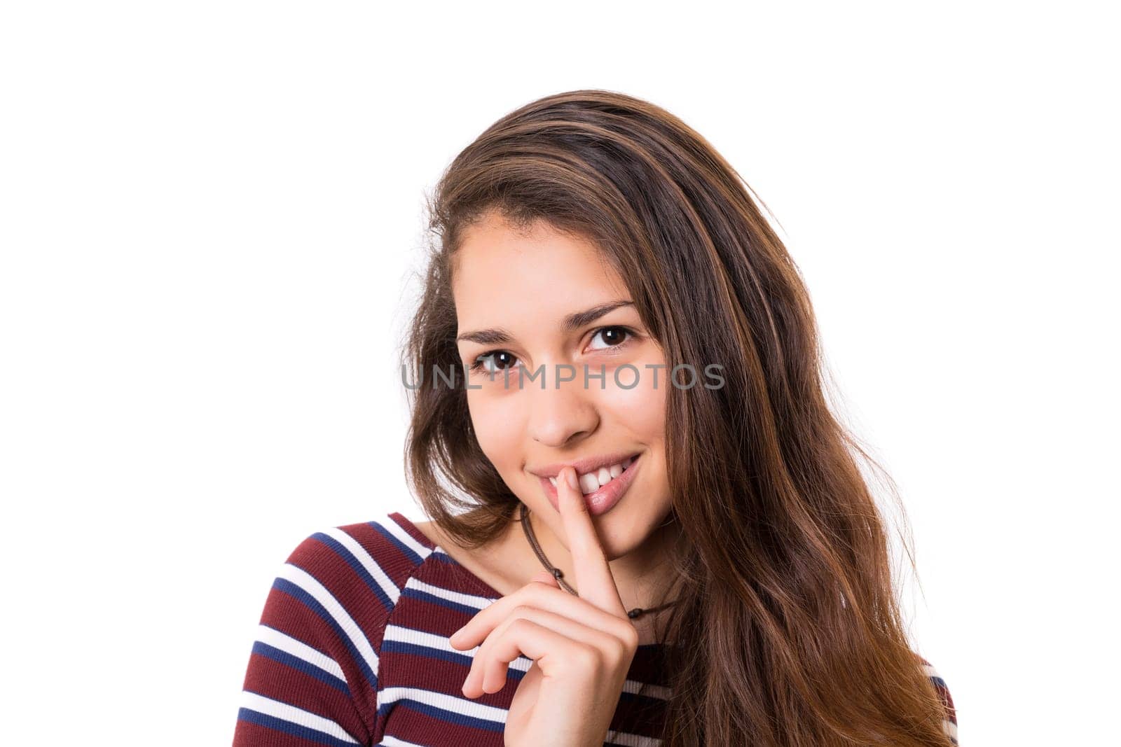 Beautiful young woman asking for silence isolated