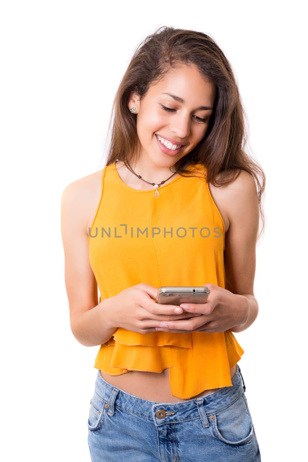 Young beautiful woman at the phone, isolated over a white background