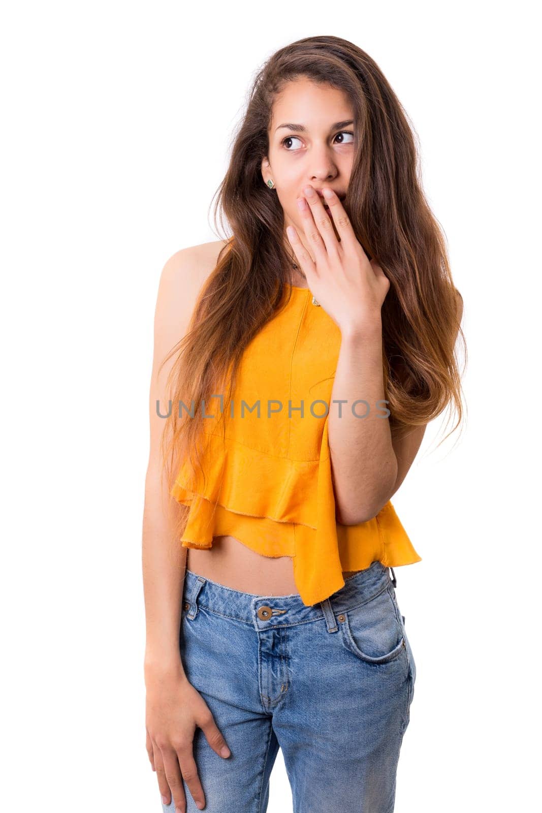 Surprised young woman isolated over white background
