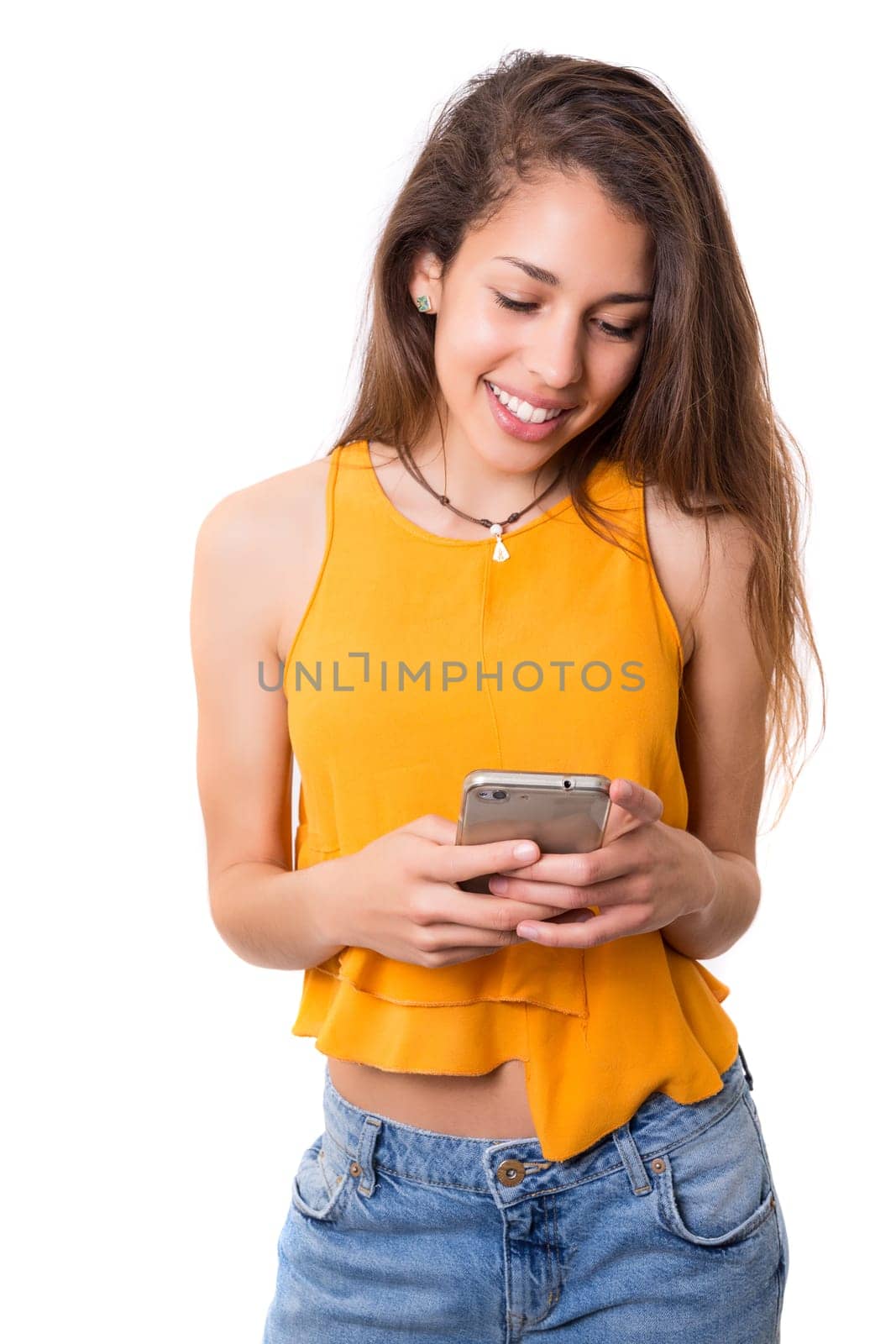 Young beautiful woman at the phone, isolated over a white background