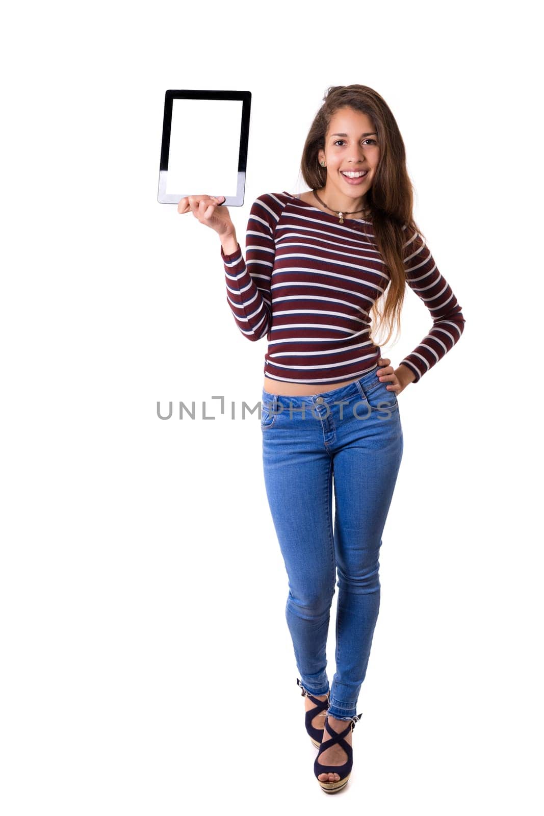 Happy young woman presenting your product in a tablet computer