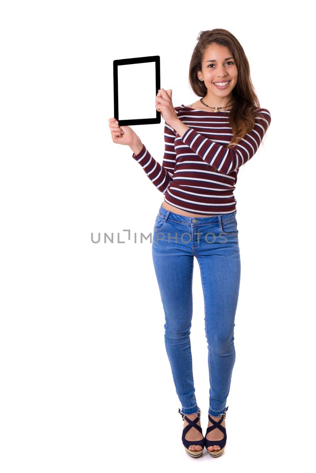 Happy young woman presenting your product in a tablet computer