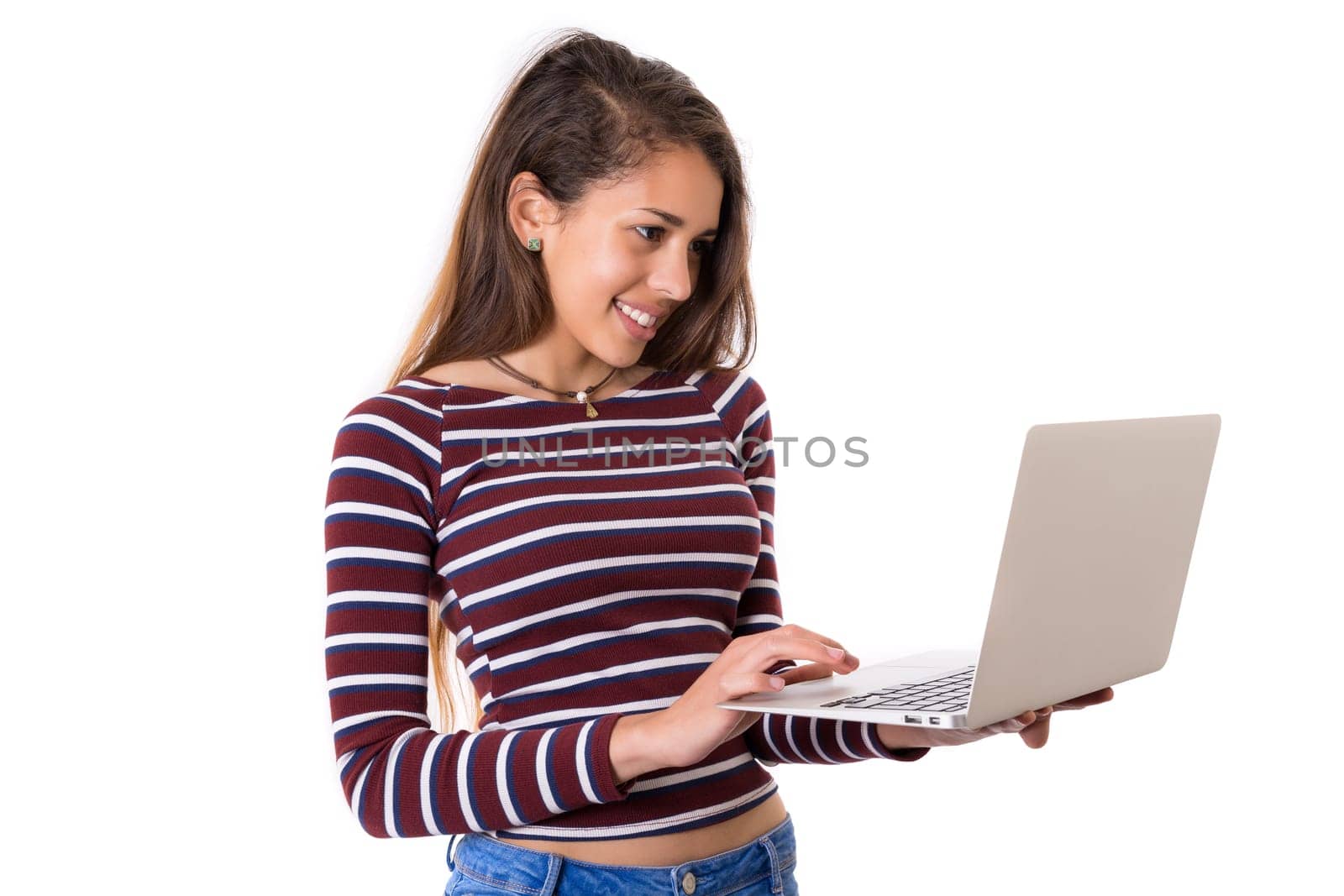 Young student working with her laptop, isolated over a white background