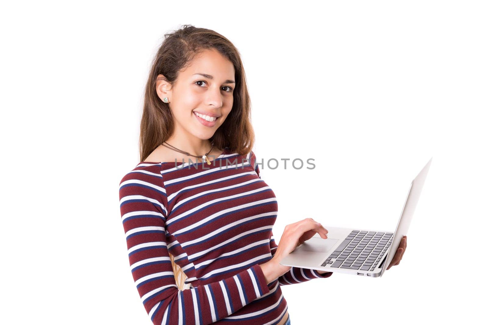 Young student working with her laptop, isolated over a white background