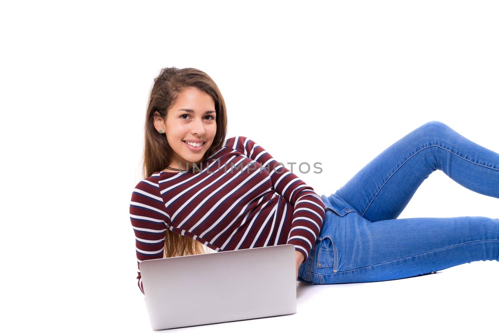 Young student working with her laptop, isolated over a white background