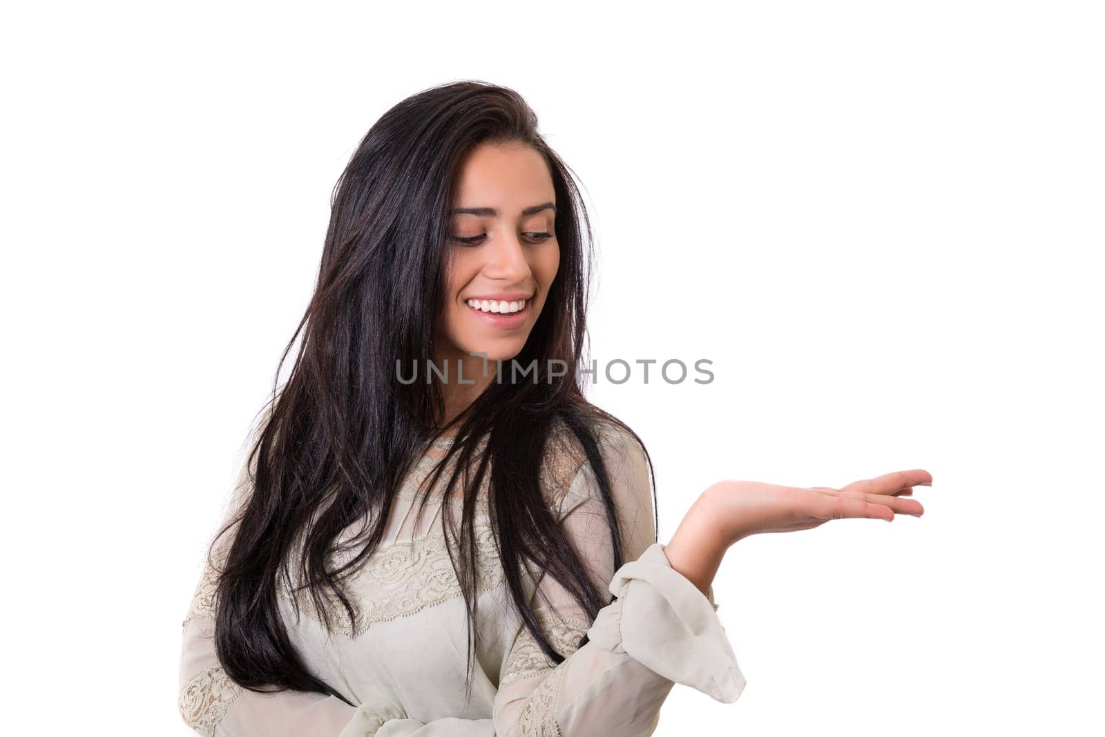 Young beautiful woman presenting your product, isolated over white background