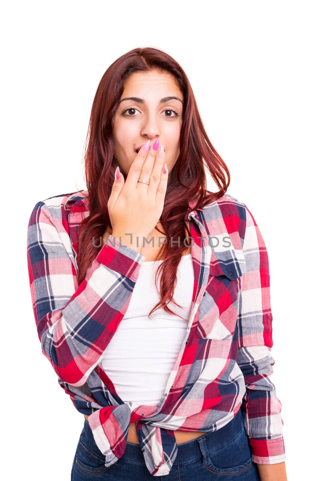 Surprised young woman isolated over white background