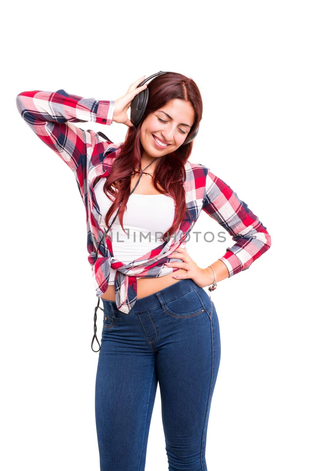 A Happy young woman listening to music