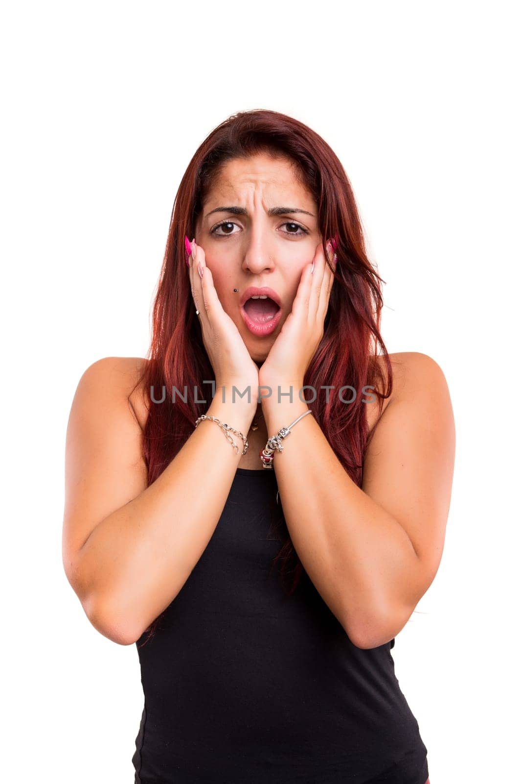 Surprised young woman isolated over white background