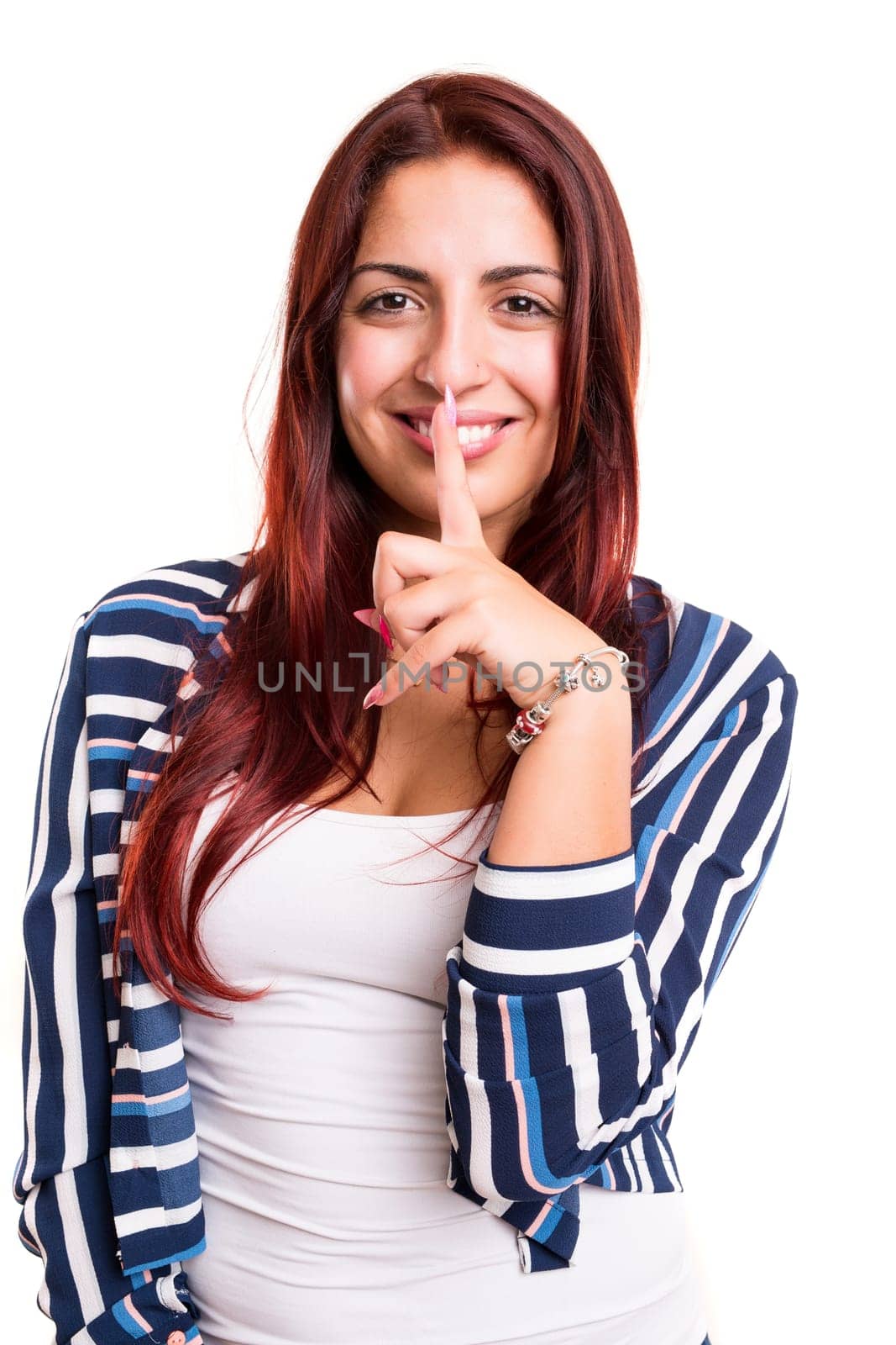 Beautiful young woman asking for silence isolated