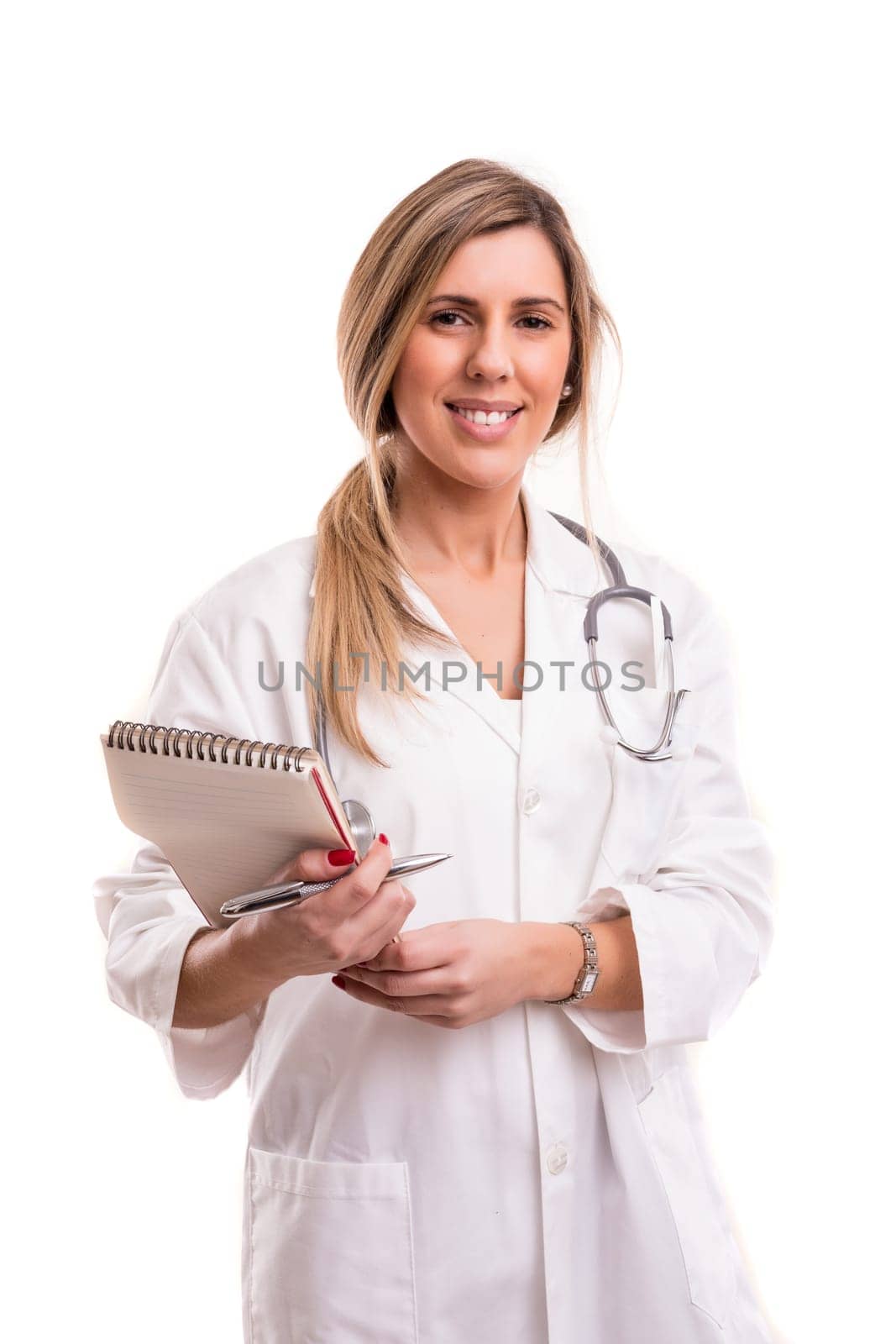 Beuatiful young medic posing isolated over a white background