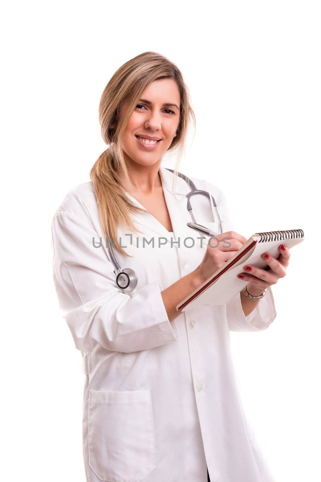 Beuatiful young medic posing isolated over a white background