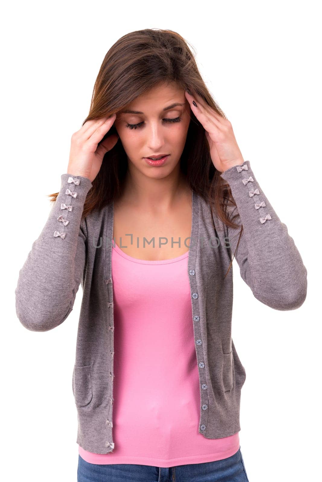 Young student tired of studying for the final exams, isolated over a white background