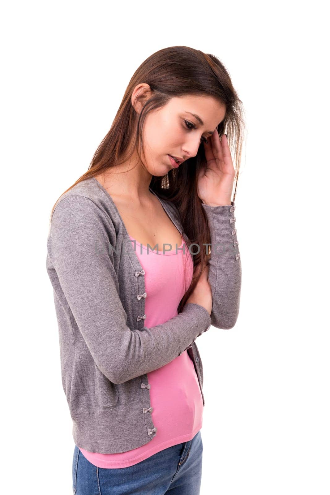 Young student tired of studying for the final exams, isolated over a white background