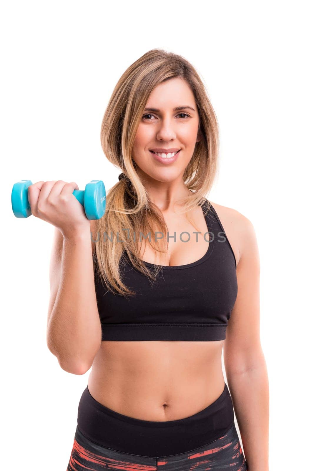 Young woman in great shape - fitness concept