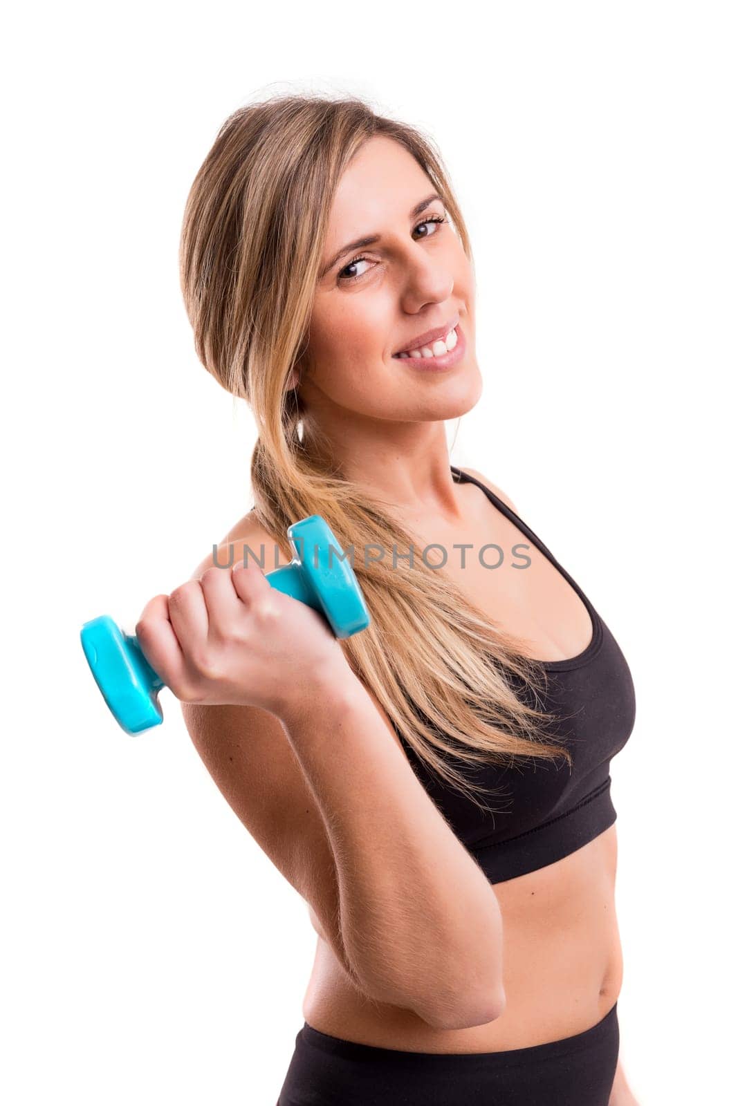 Young woman in great shape - fitness concept