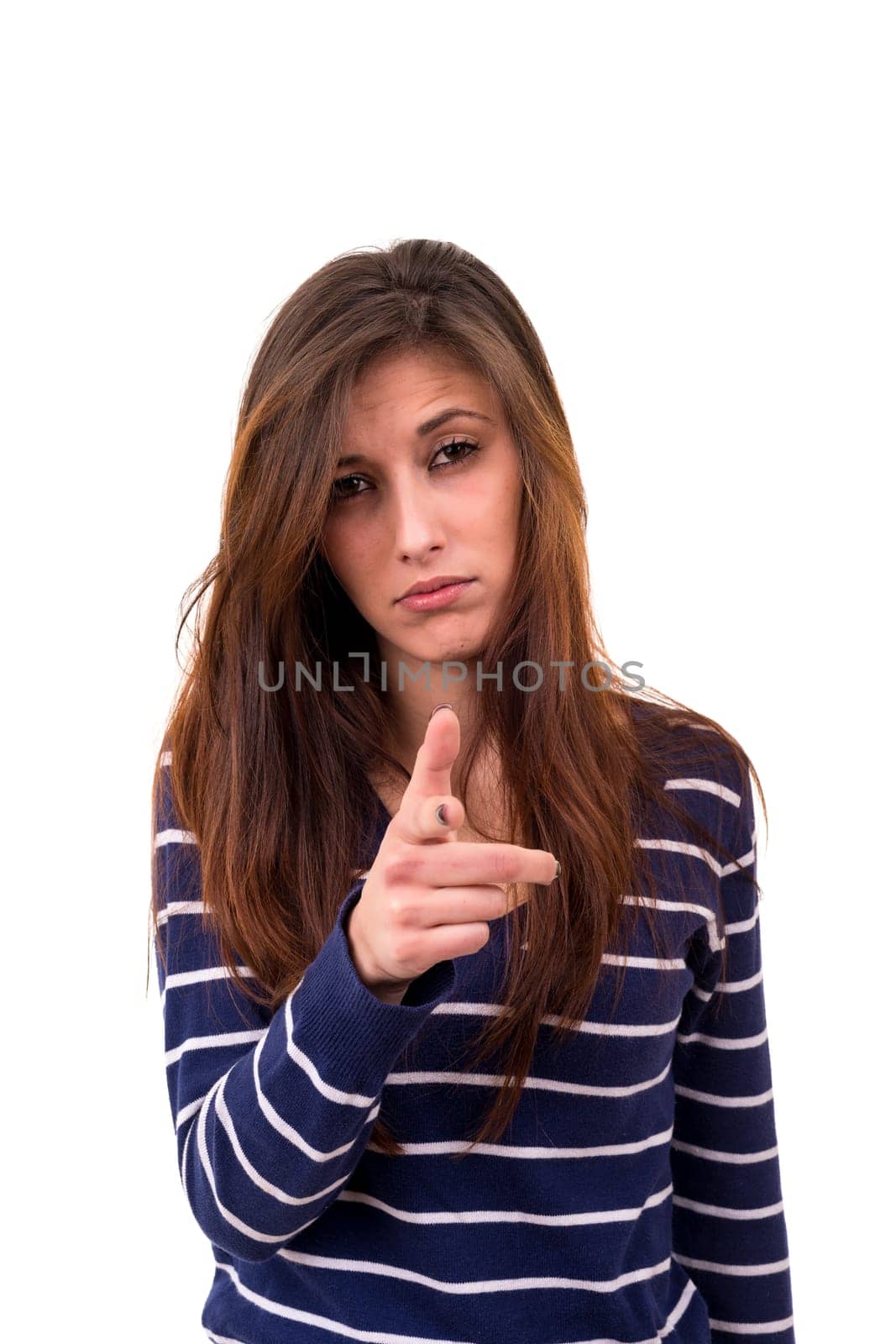 Studio shot of a young woman signaling thumbs down